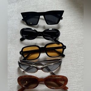 5 pair of sunglasses